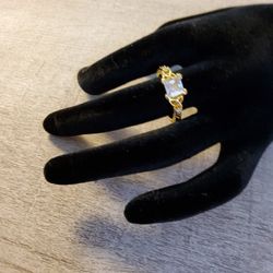 New Gold Plated Ring It holds Up really Well  .   Size  . 8"  