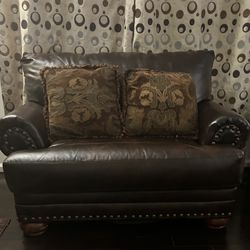 Loveseat And Ottoman With Throw Pillows For Sale