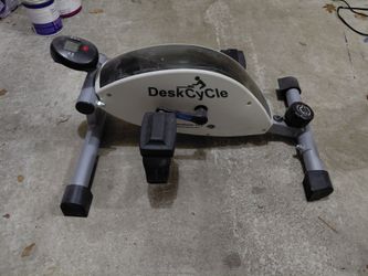 Desk pedaling exercise machine