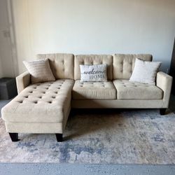 Modern Ashley HomeStores Cream White Tufted L-Shape Sofa with Reversible Chaise
