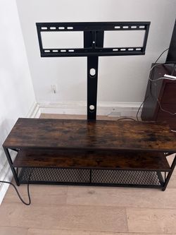 TV stand with electronic outlet