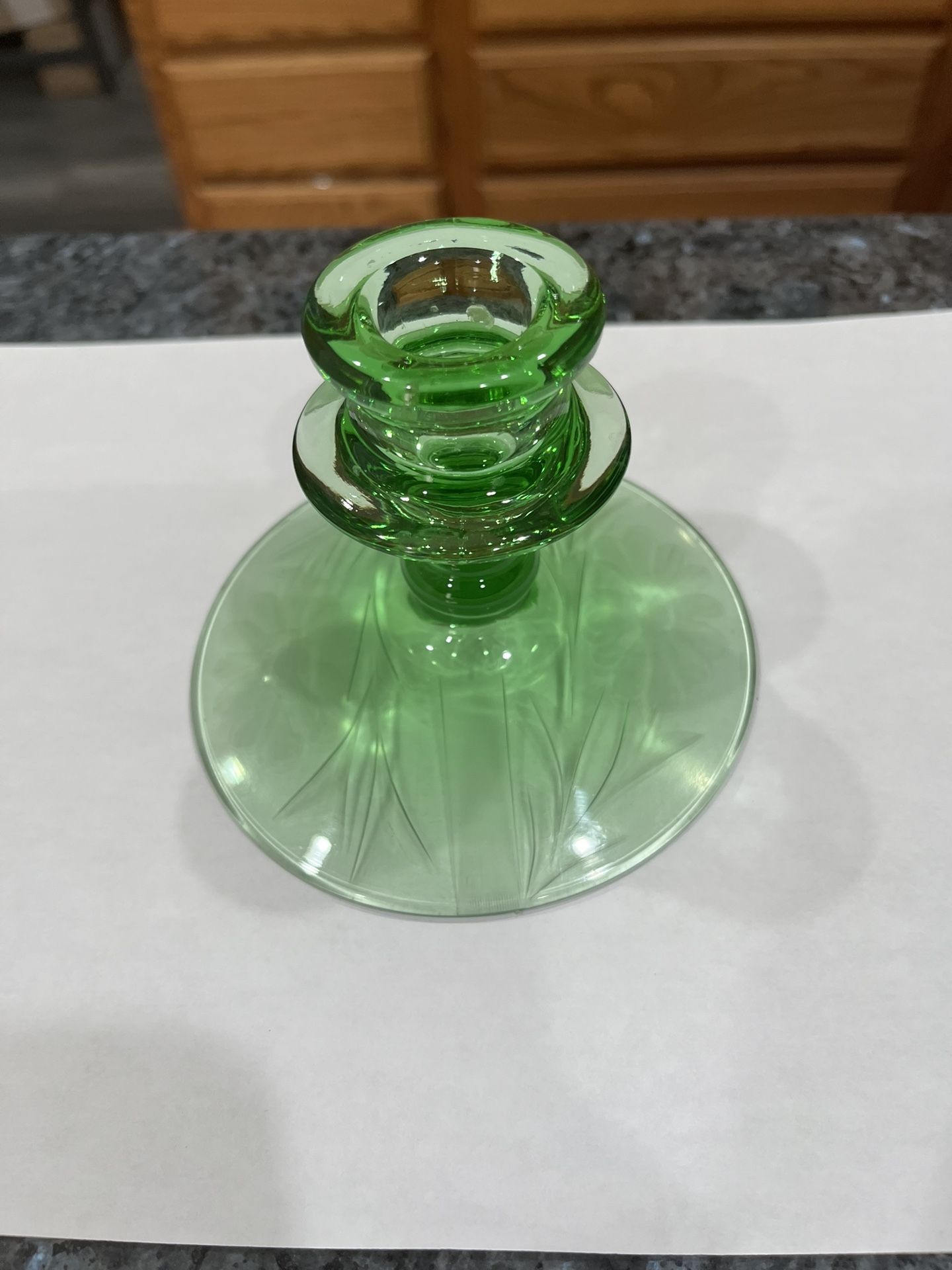 Vintage Fostoria Green Etched Glass Candlestick Holder. Beautiful color. Size approximately 3 1/2 Tall and 4 1/2 Inches Wide at the base. Has been