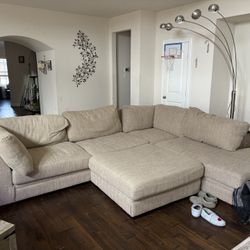 “Neutral L-shaped sectional couch. Plenty of seating, well cared for.”