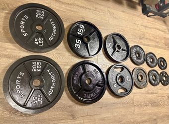 Full set of Olympic Cast Iron Weight Plates; all Reconditioned good as NEW . Total: 246 lbs
