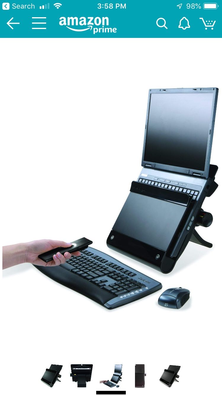 Computer notebook docking station by Kensington, contains USB hub and includes keyboard and mouse.