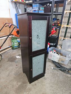 Free wood and glass storage cabinet