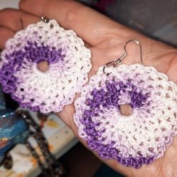 Purple and white spiral patterned earrings 