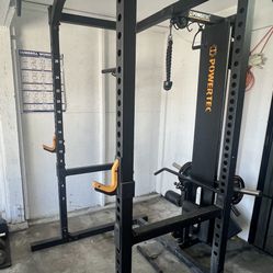 Squat Rack And Lat Down With Weights And Barbell