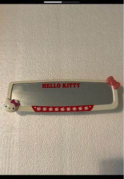 Hello Kitty face Interior rearview mirror with Hello Kitty accent on the corner and a classic white frame.