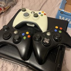 Xbox360 with controllers and games