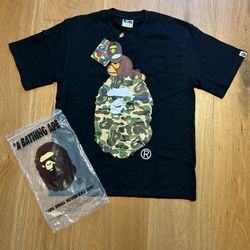 Bape Baby Milo sleeping on Big Ape Tee