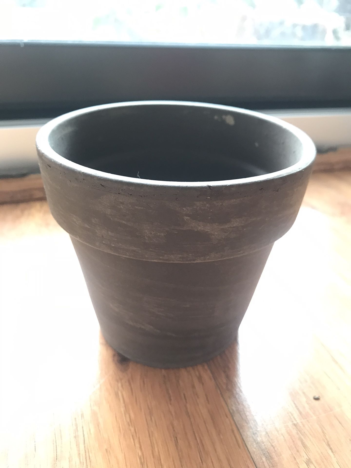 Brown plant pot with drainage hole