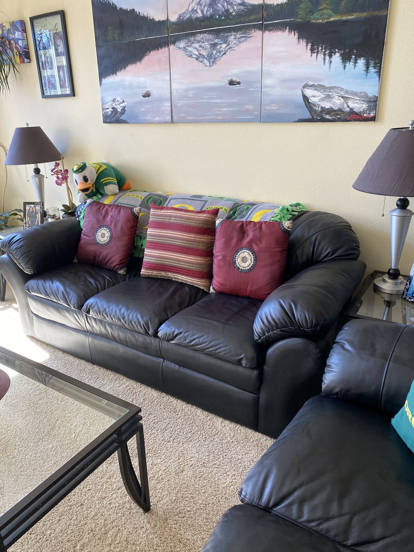 Ashley black leather sofa, loveseat, glass coffee table & two end tables