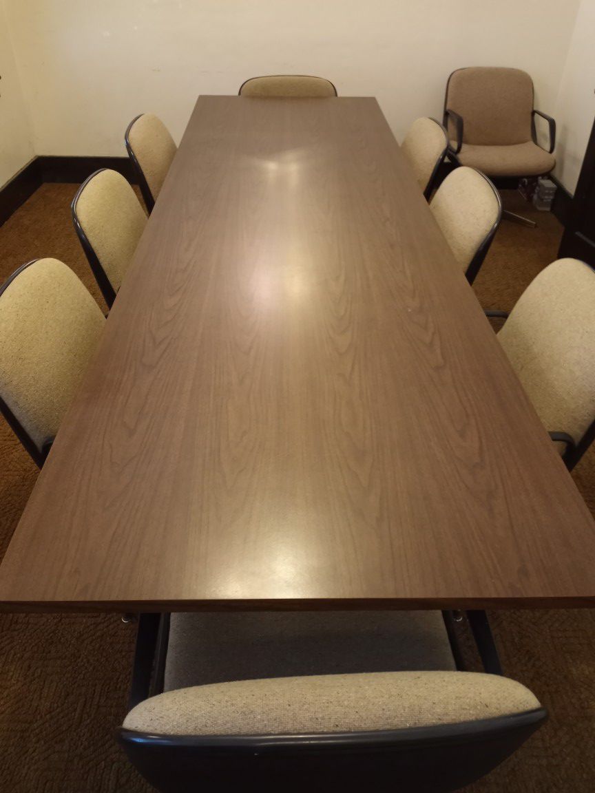 Conference table with 10 chairs