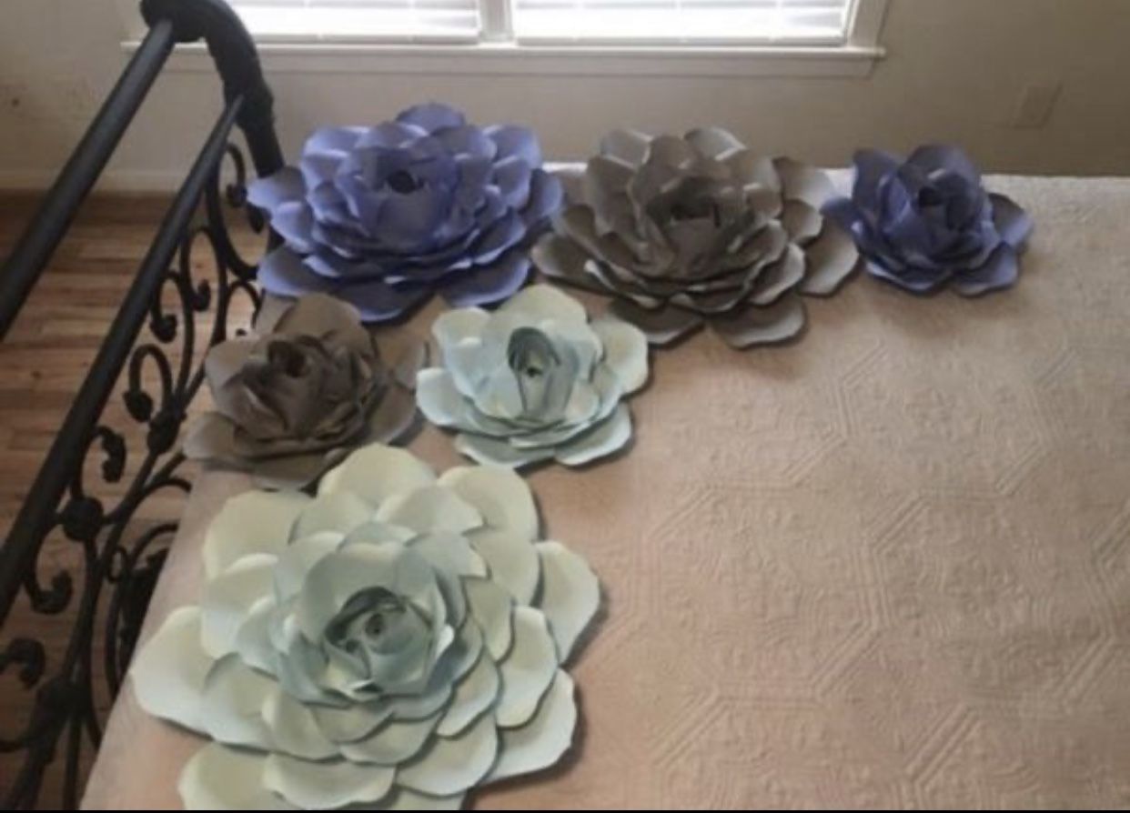 3 large paper roses and 3 medium paper roses.. lime green leaves included