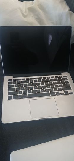 The Apple MacBook Pro model A1502, 13.3-inch laptop with a Retina display
