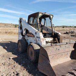 Bobcat S250 With Backhoe And Concrete Breaker