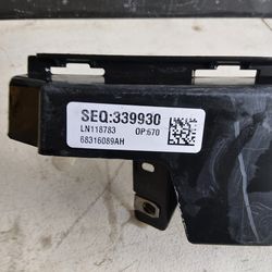 19-22 DODGE RAM 1500  HEADLIGHT BRACKET