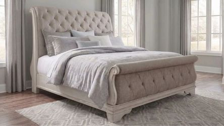 Ashley Furniture Upholstered California king Bed frame Realyn sleigh bed