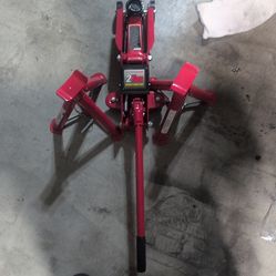 Brand new 2-ton Jack and jack stands