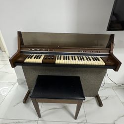Piano and chair in excellent condition