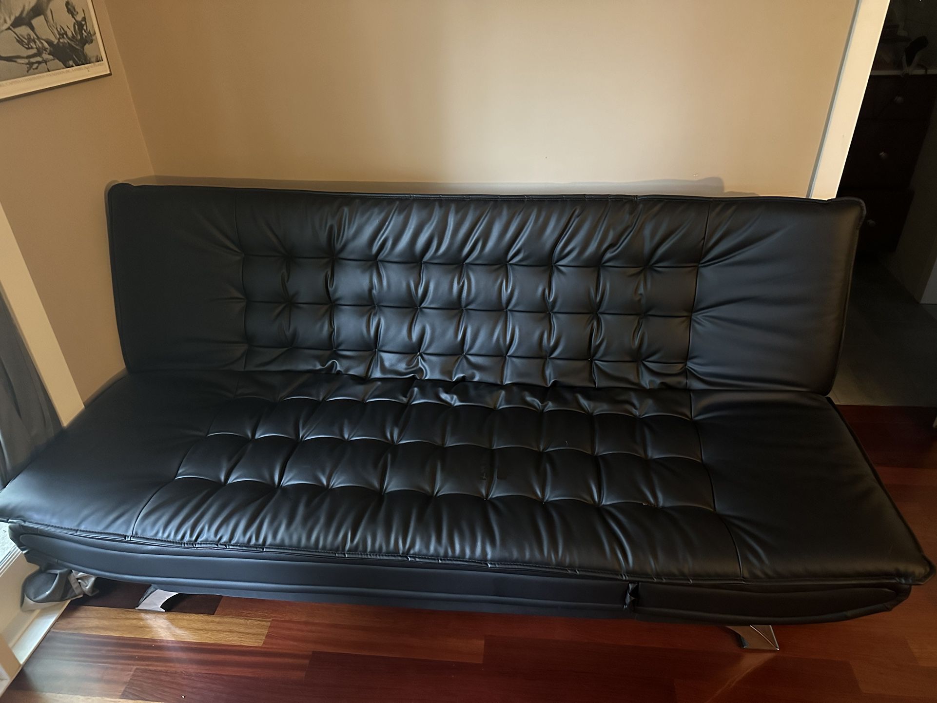 2 (Identical) Black Leather Futons. $450 Each