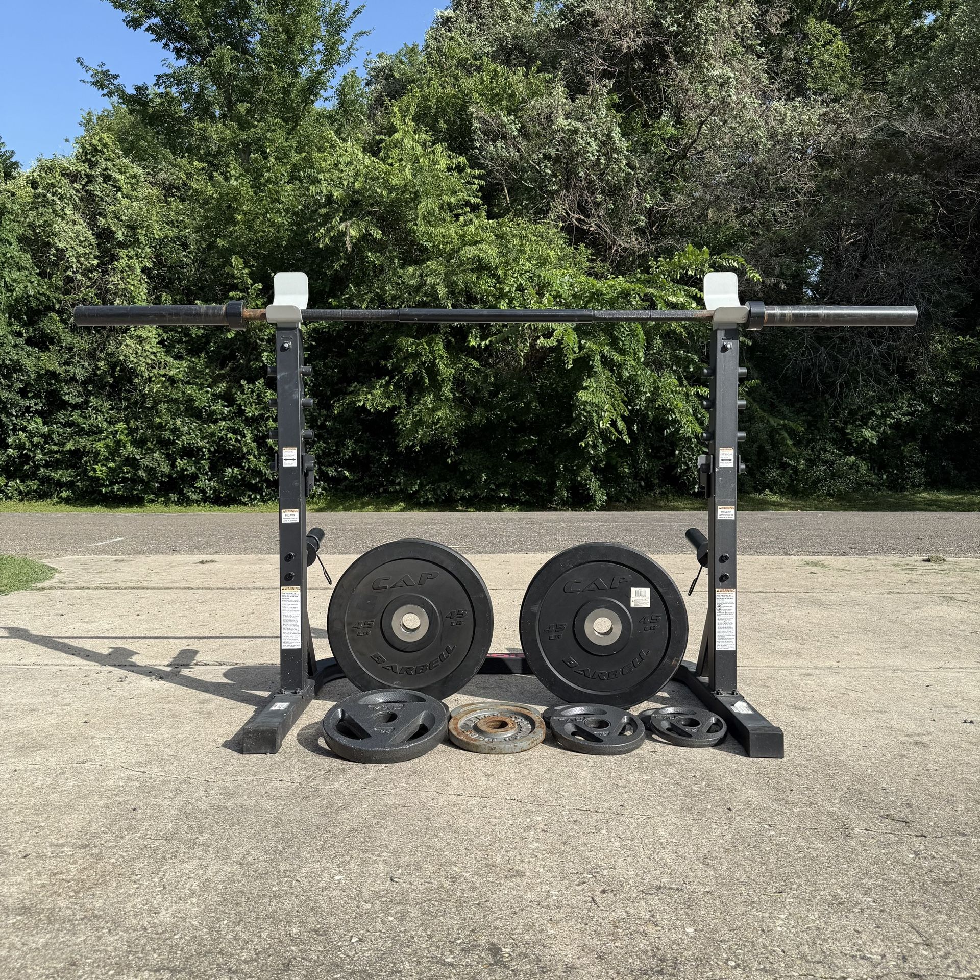 Adjustable Weider Squat Rack + 225 lbs Olympic Weights + 35 lb Barbell