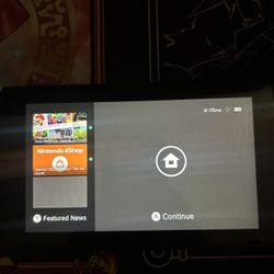 Nintendo Switch with Neon Blue and Neon Red Joy-Con