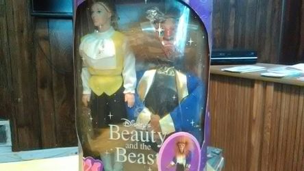 Vintage Disney beauty and beast dolls and little mermaid