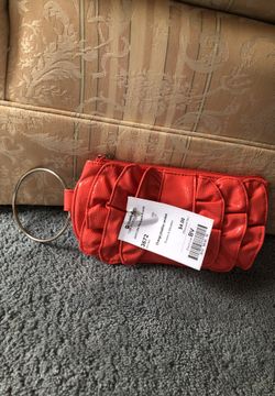 Tangerine colored wristlet