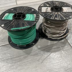 Two Partial Rolls Of Cable