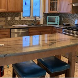 Granite Kitchen  Pedestal Island With Two Leg Legs Attached To Wall