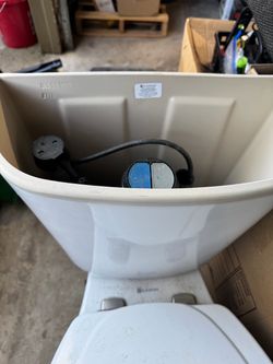 Top flush toilet
