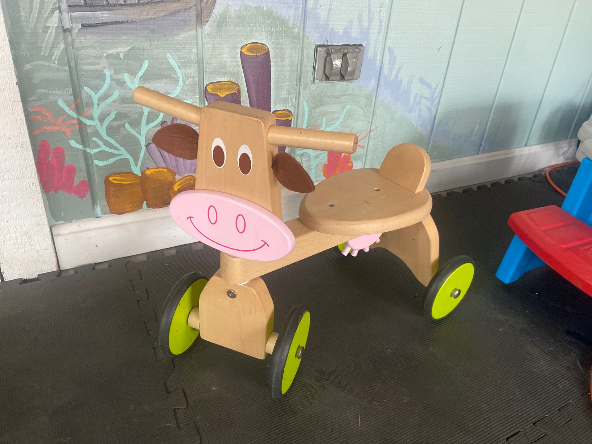 Kids wooden ride on toy