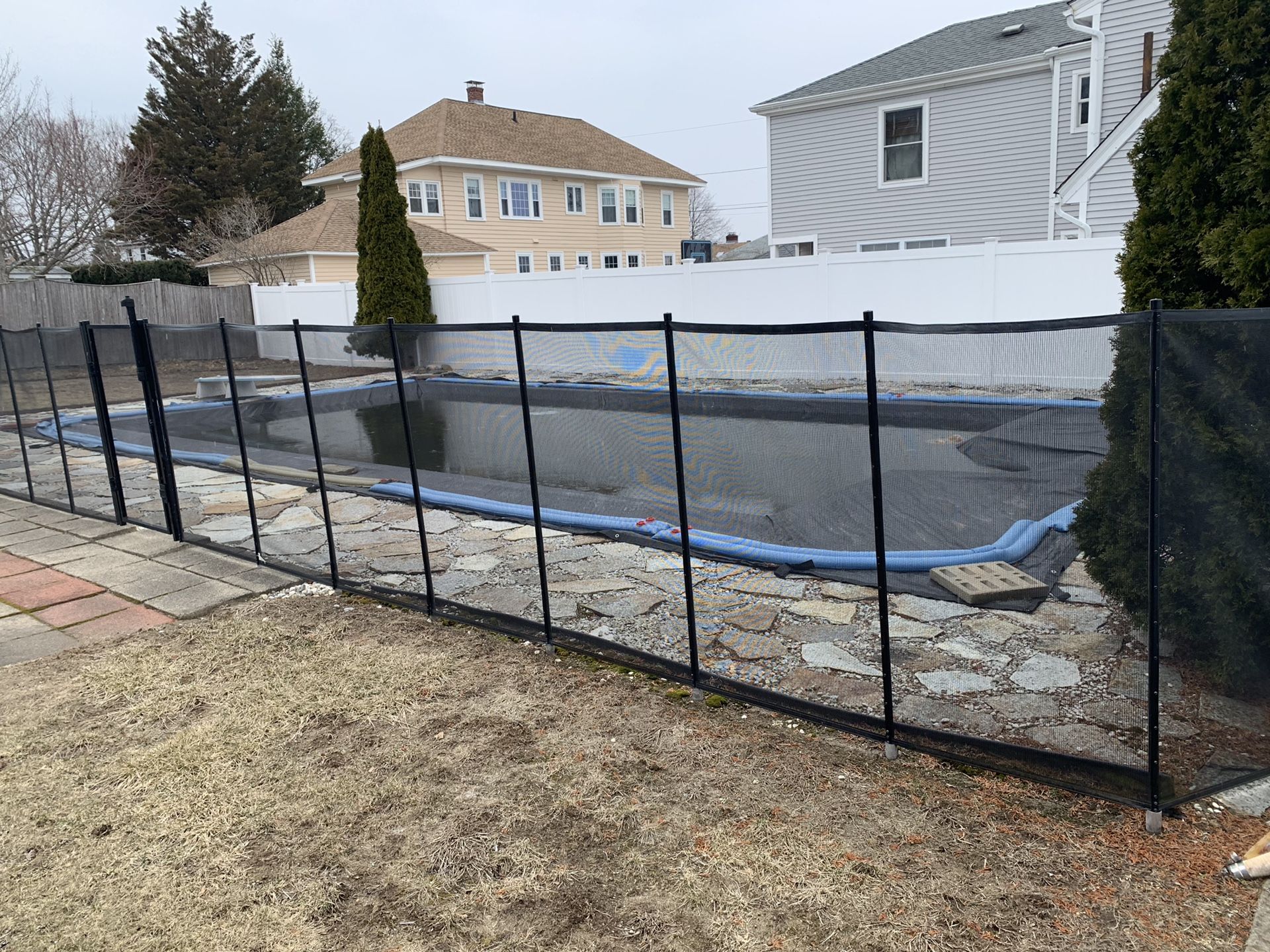 Babyloc pool fence. 5 ft high and about 45 feet of fence including a locking gate.