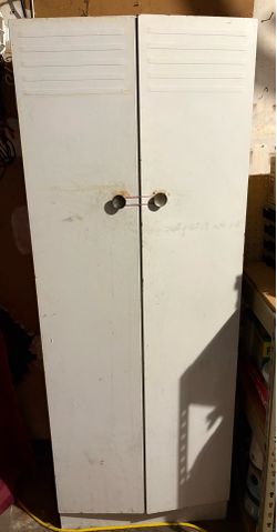 Used metal storage cabinet
