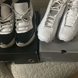 2 Pairs Of Jordan 11s  And Jordan 13 Retro 