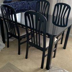 Six Chairs, A Table And Glass Top Cover 