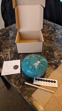 Teal green Steel Tongue Drum with Mallet and Song Book. 4.5 inch