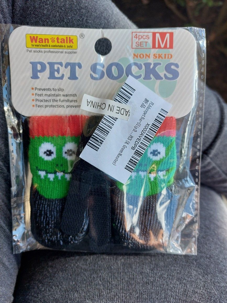 New In Sealed Package. Pet Socks. Cat Or Dog. Non Slip Socks. With Velcro To Help Keep On. Help Protects Furniture As Well. .