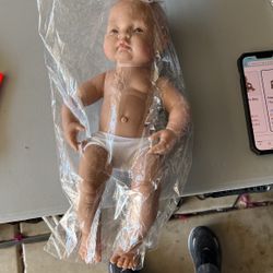 Hispanic girl, baby doll
