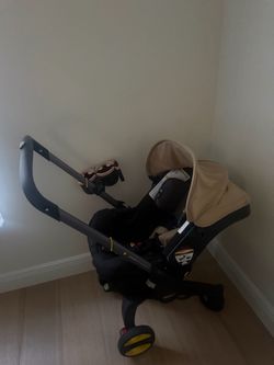 Doona+ Car Seat & Stroller with two bases