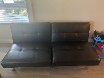 Futon sofa cum bed- leather