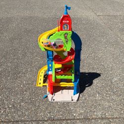 Fisher Price Sit N Stand Skyway Racetrack
