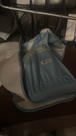 Brand new blue baby carrier.