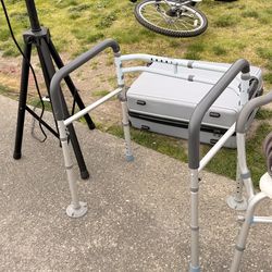 Shower chair and toilet holding stand