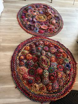 Multi color round Area rug $30 each or $50 for the pair