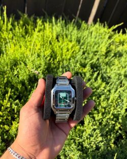 Green face luxury watch santos