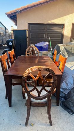 Dinner table with six chairs