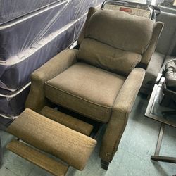 Brown Recliner Sofa Chair, good condition, It has a small scratch on the fabric near the leg, 